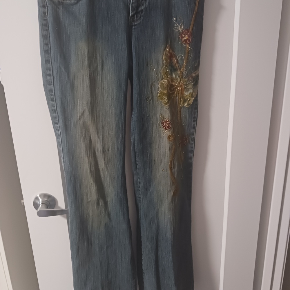 Blue Boot Cut Jeans with Vintage Distressing